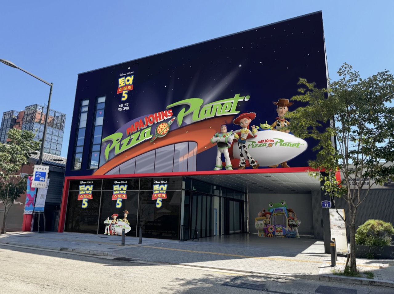 Papa Johns Pizza Planet storefront decorated for Toy Story 5