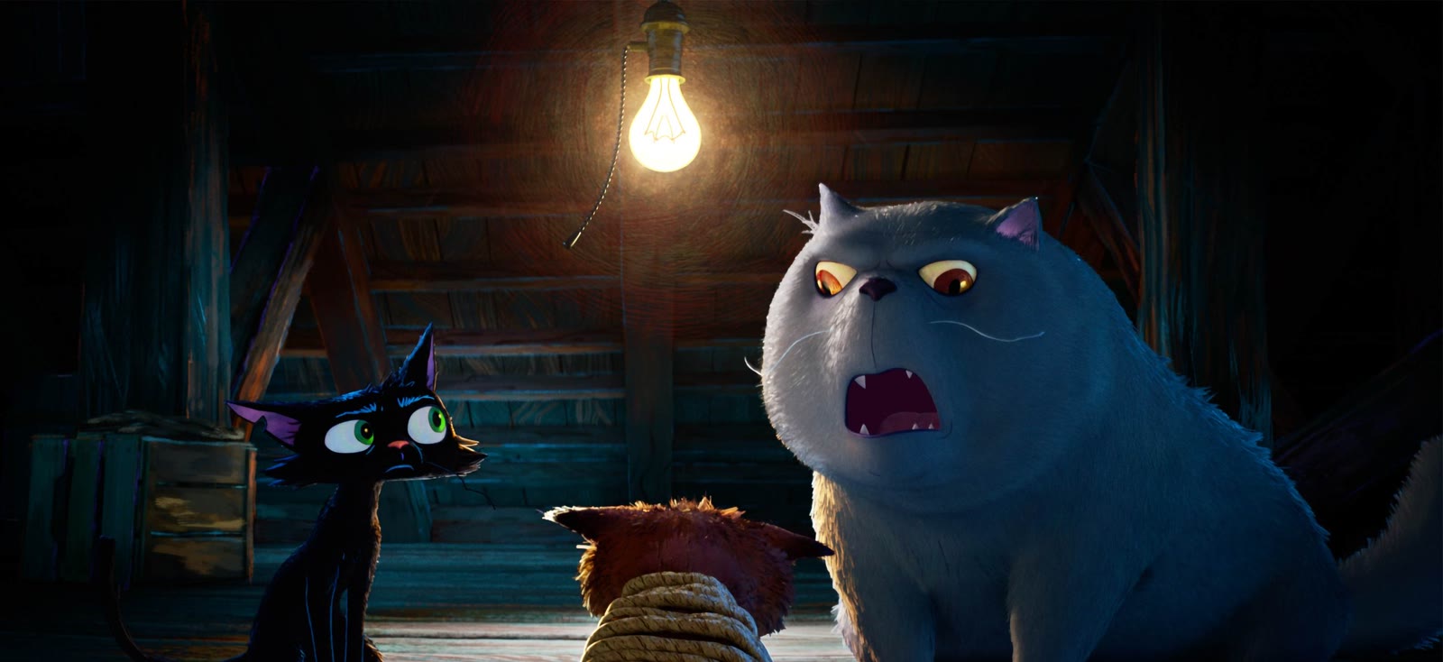 Nero and a larger white cat under a hanging light in a still from Disney and Pixar's Gatto teaser