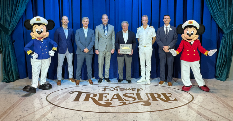Disney Treasure plaque exchange with port and cruise-line representatives