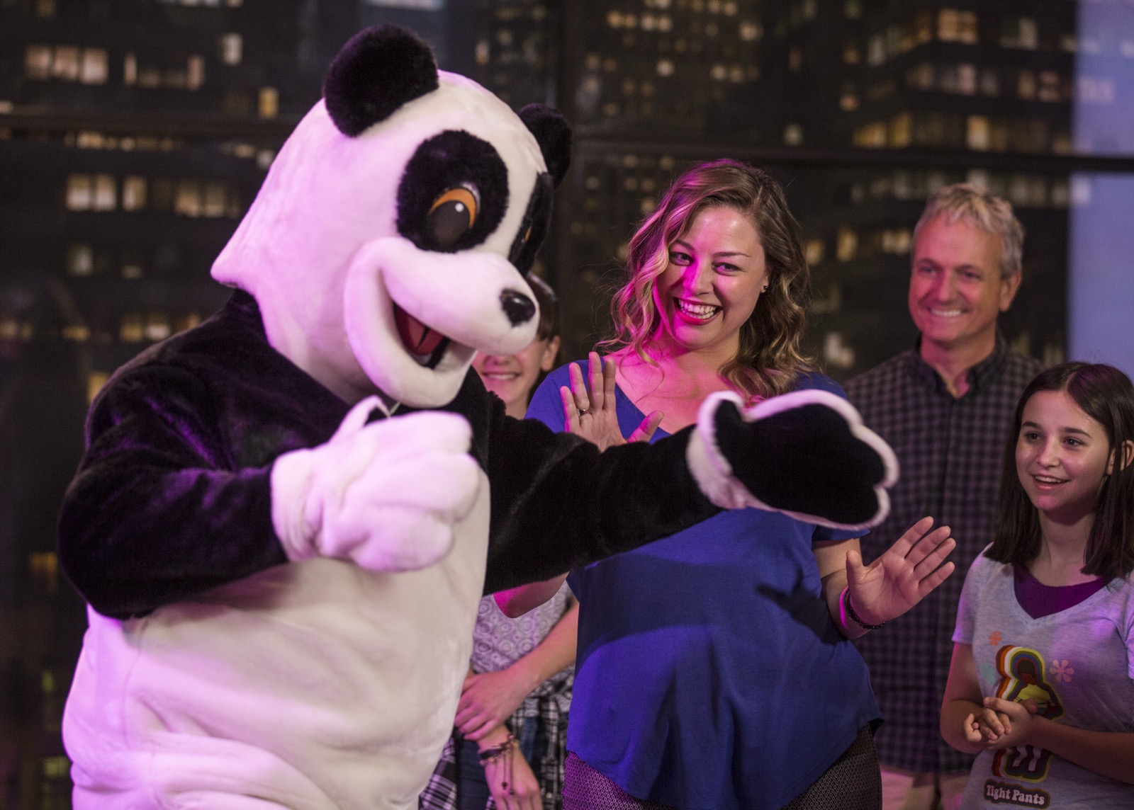 Hashtag the Panda greets guests inside Race Through New York Starring Jimmy Fallon