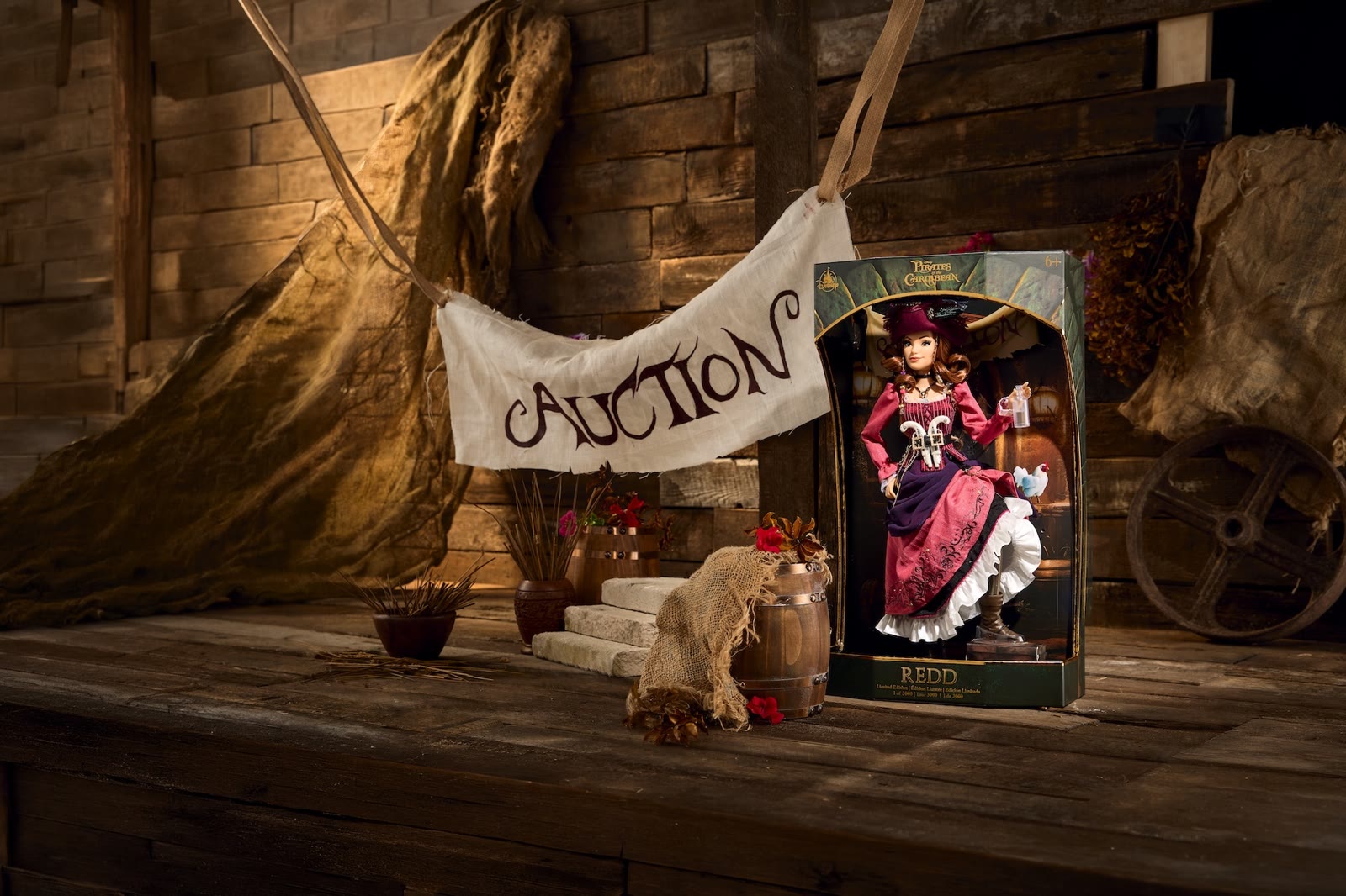 Redd limited-edition doll and pirate auction packaging