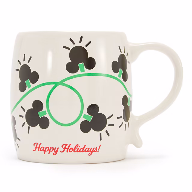 White Mickey Mouse holiday mug with black Mickey icon bulbs and a green string-light cable