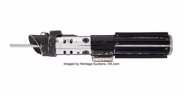 Darth Vader's screen-matched dueling lightsaber photographed for the Heritage Auctions lot