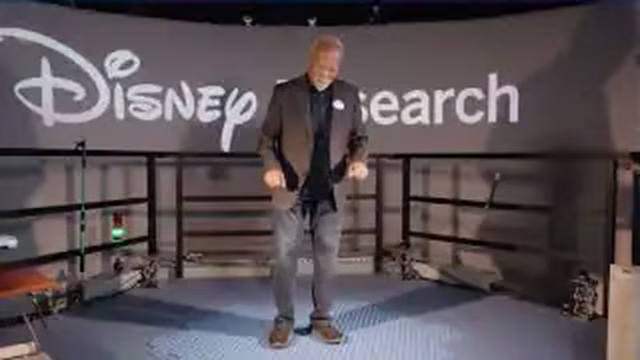 Disney Imagineer Lanny Smoot demonstrates the HoloTile floor at Disney Research