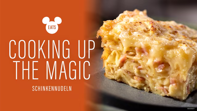 Schinkennudeln pasta gratin beside the Disney Eats Cooking Up the Magic title