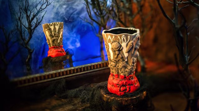The Jack Skellington mug displayed in a dark forest scene