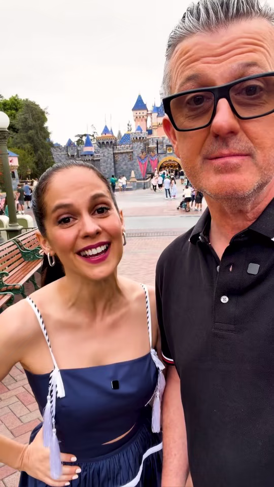 Mel and Dave take a selfie in front of Sleeping Beauty Castle at Disneyland