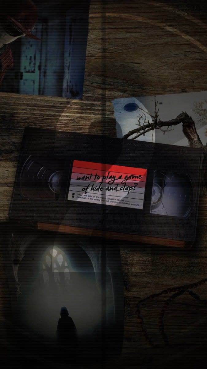 A VHS tape labeled hide to play a game of hide and clap beside a shadowy haunted house scene