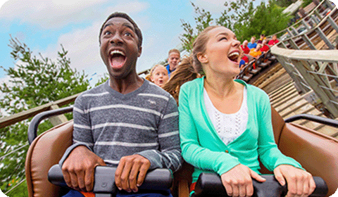 Guests ride a roller coaster at Six Flags Discovery Kingdom
