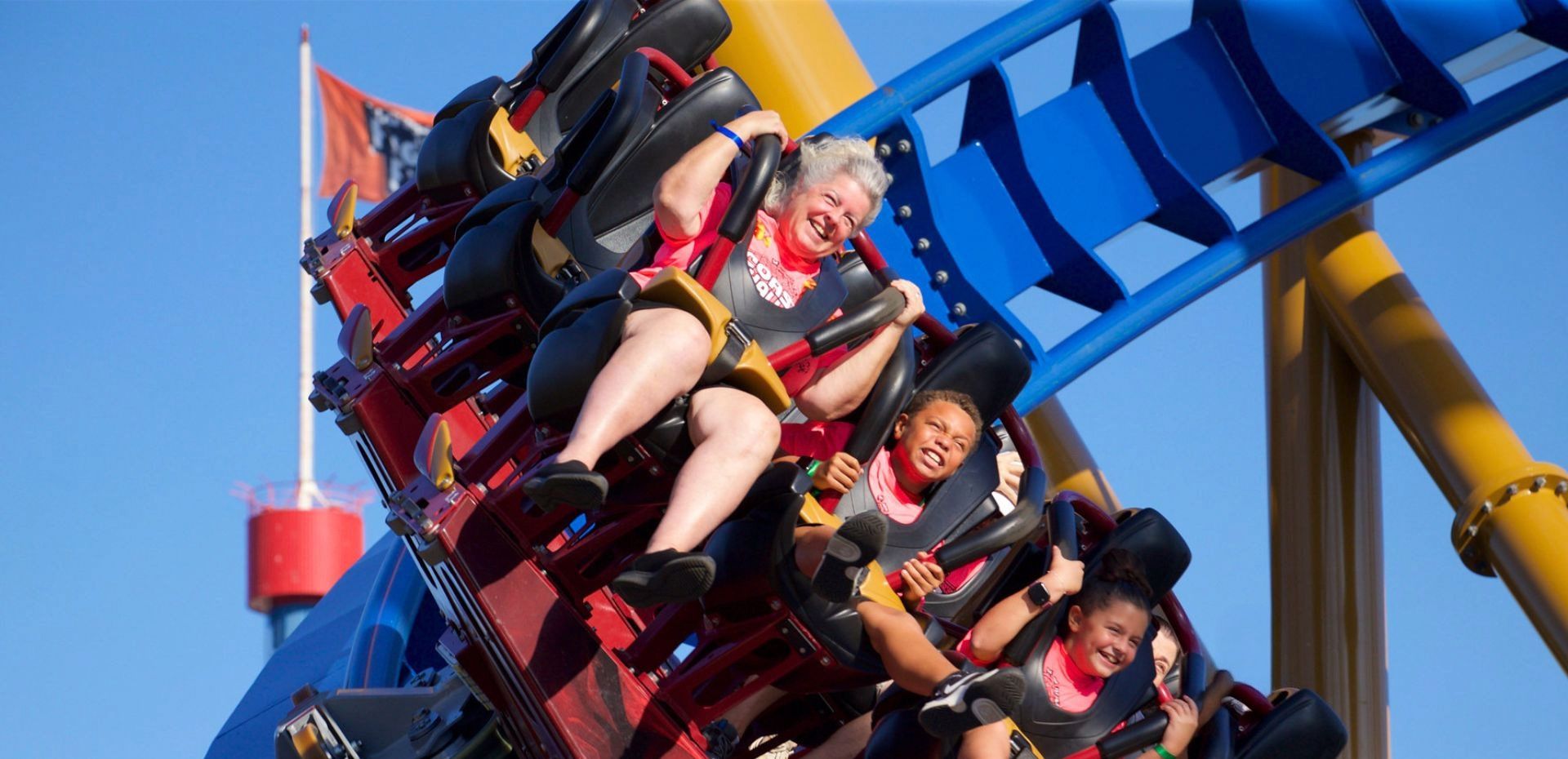 Guests ride a roller coaster at Six Flags Great America