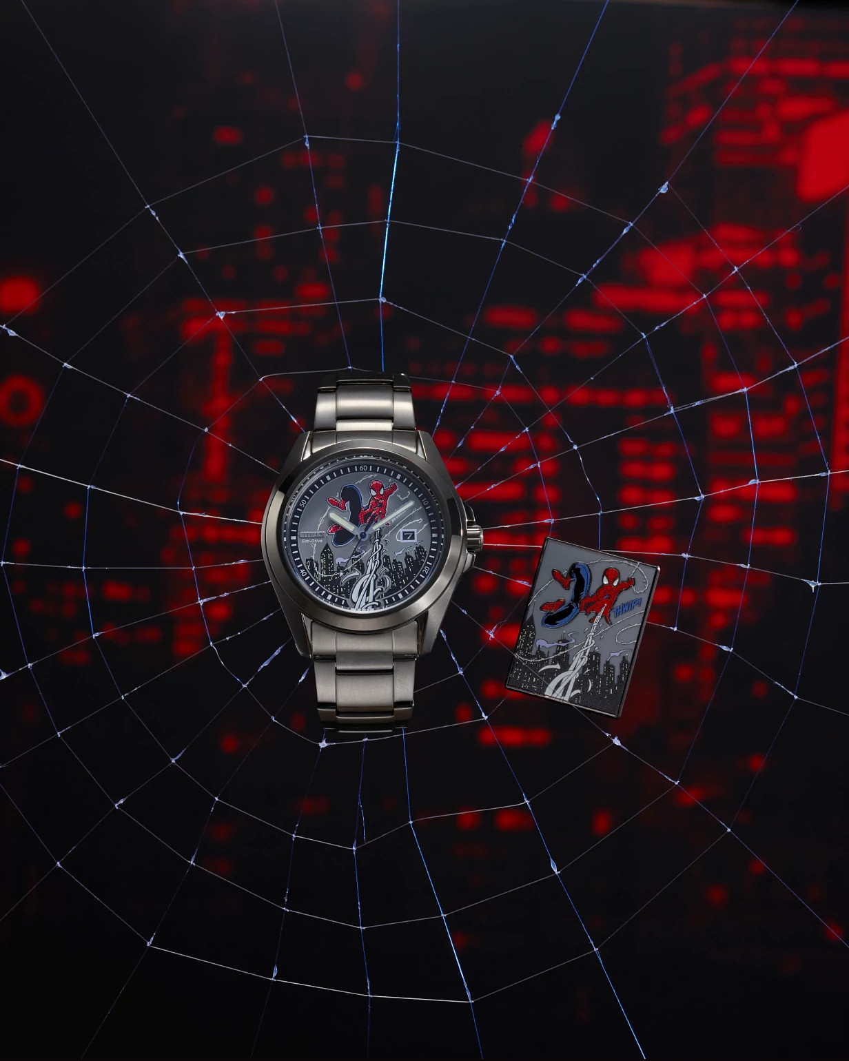Citizen Spider-Man watch and matching collectible pin against a web background