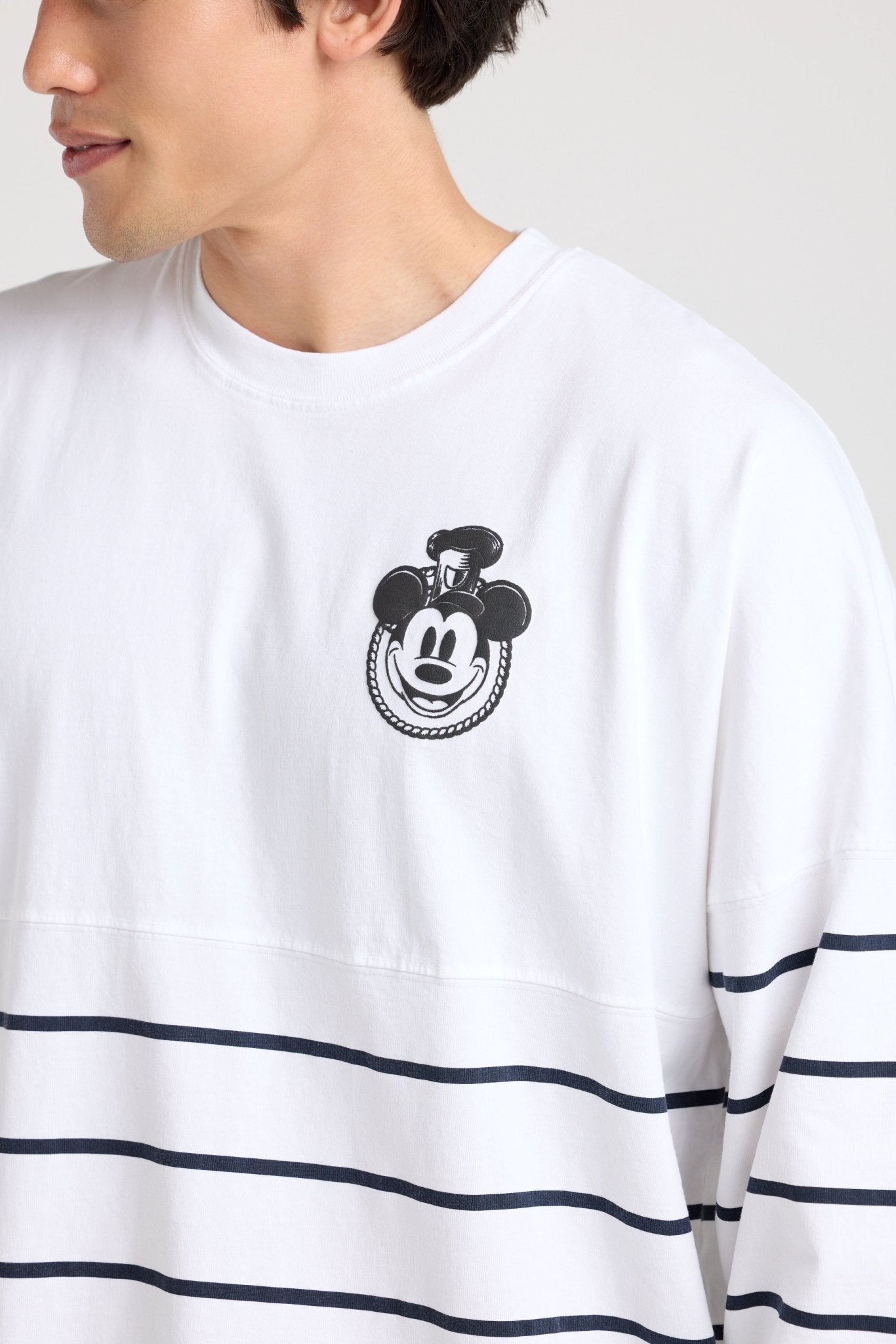 Mickey Mouse chest graphic on the striped Steamboat Willie Spirit Jersey
