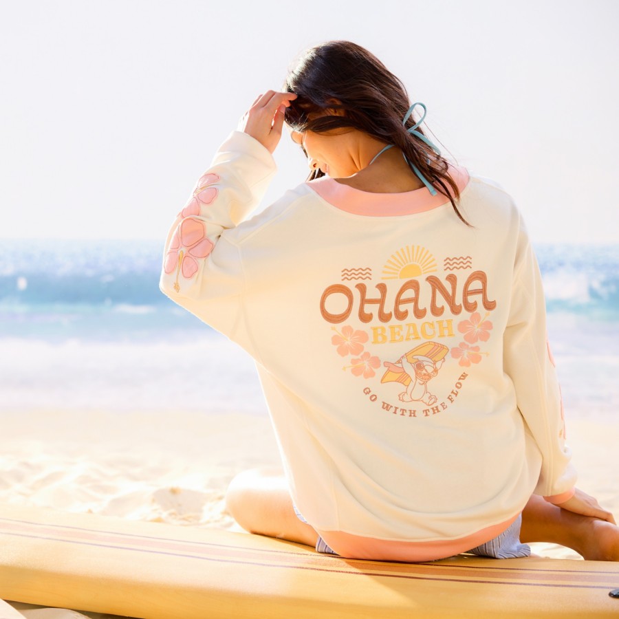Model wearing the Stitch Surf Pullover Sweatshirt from Disney Store
