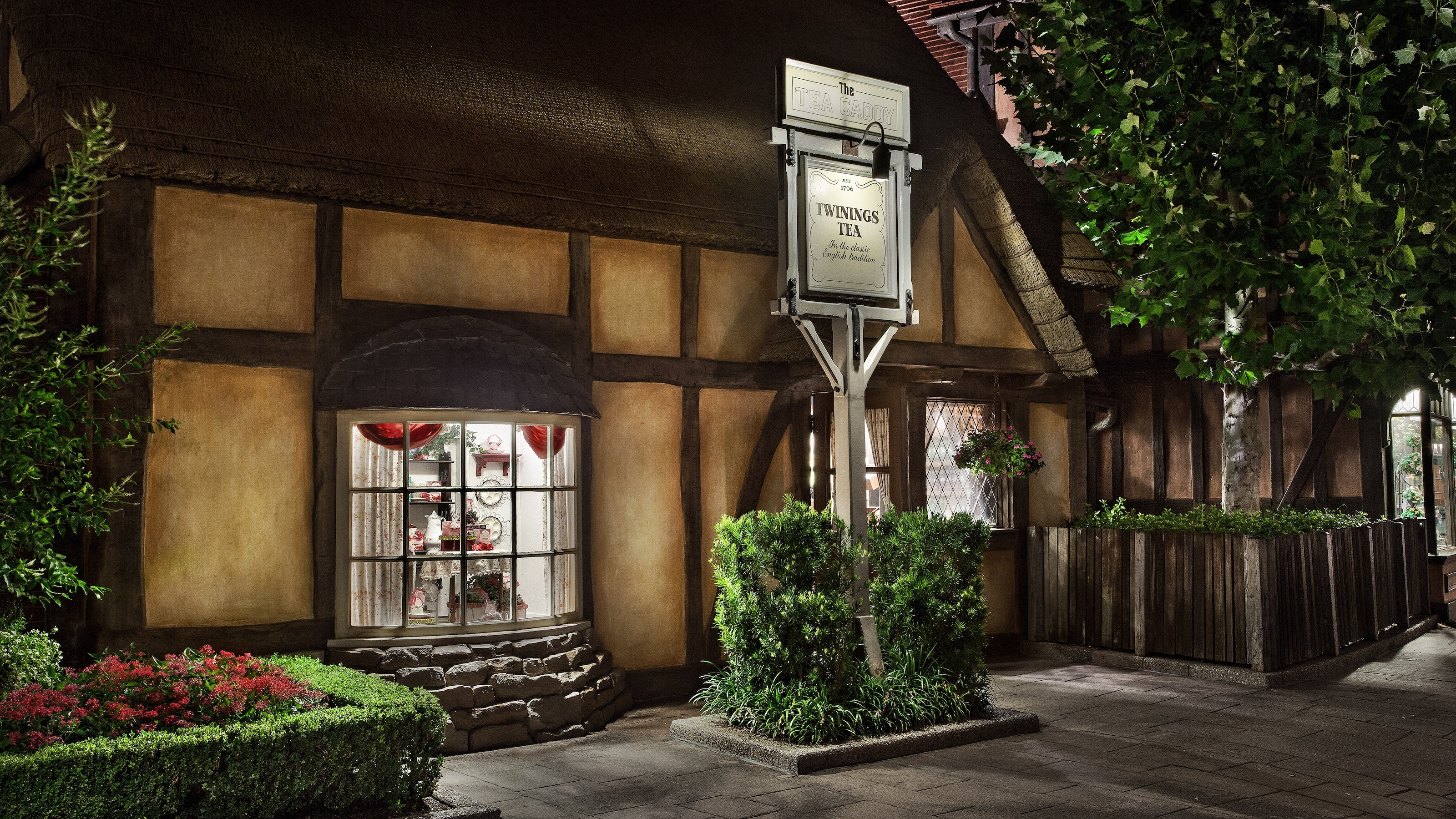 The Tea Caddy storefront and Twinings sign in EPCOT’s United Kingdom pavilion.