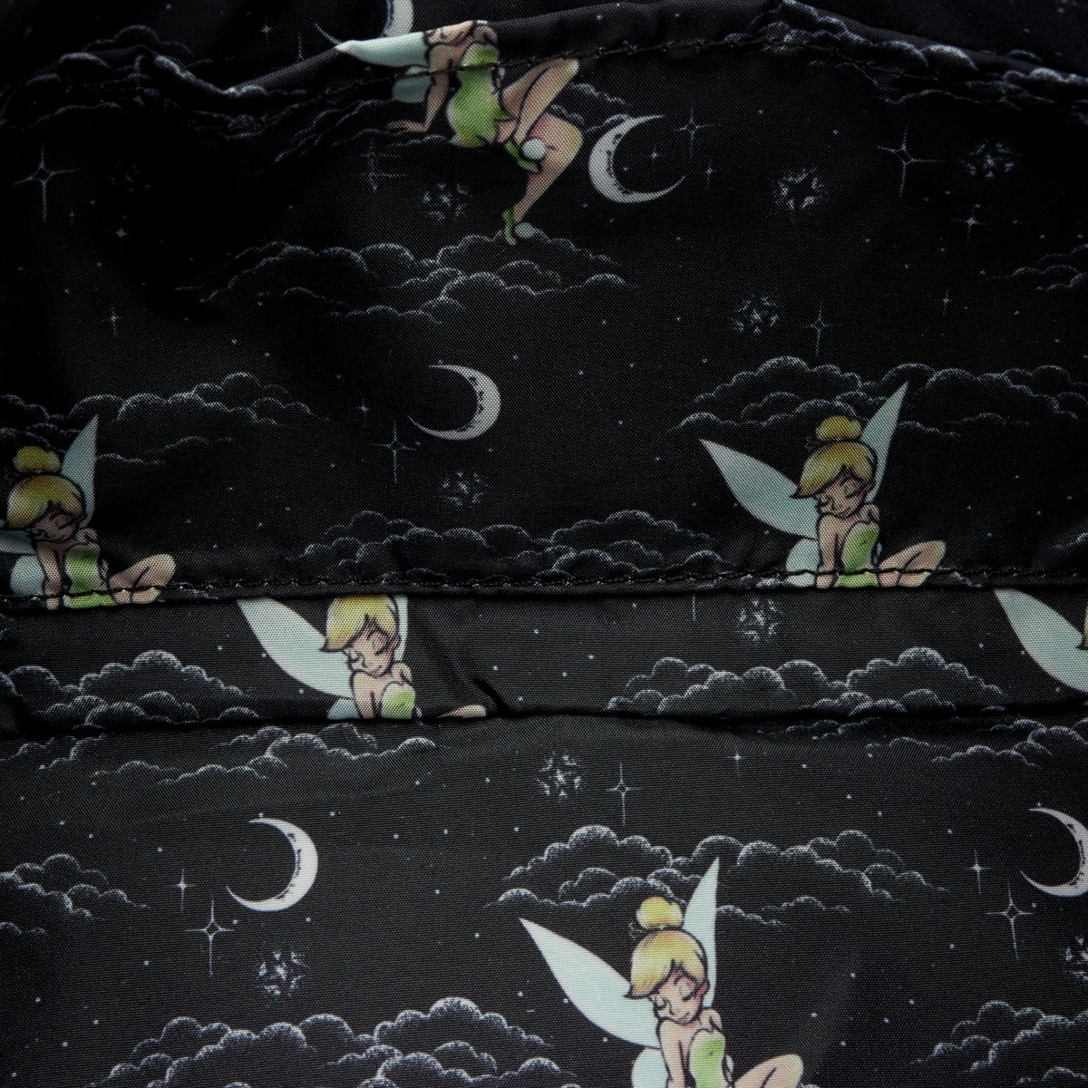 Tinker Bell cloud and moon lining inside the Pixie Dust crossbody bag