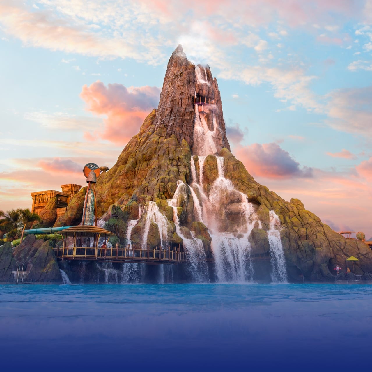 Krakatau volcano at Universal Volcano Bay with waterfalls and a pool in the foreground