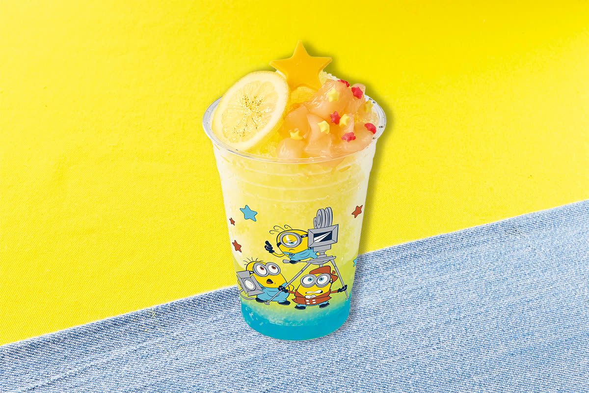 Movie Star Minion Frappe with peach, lemon, stars, and Minions film-camera artwork