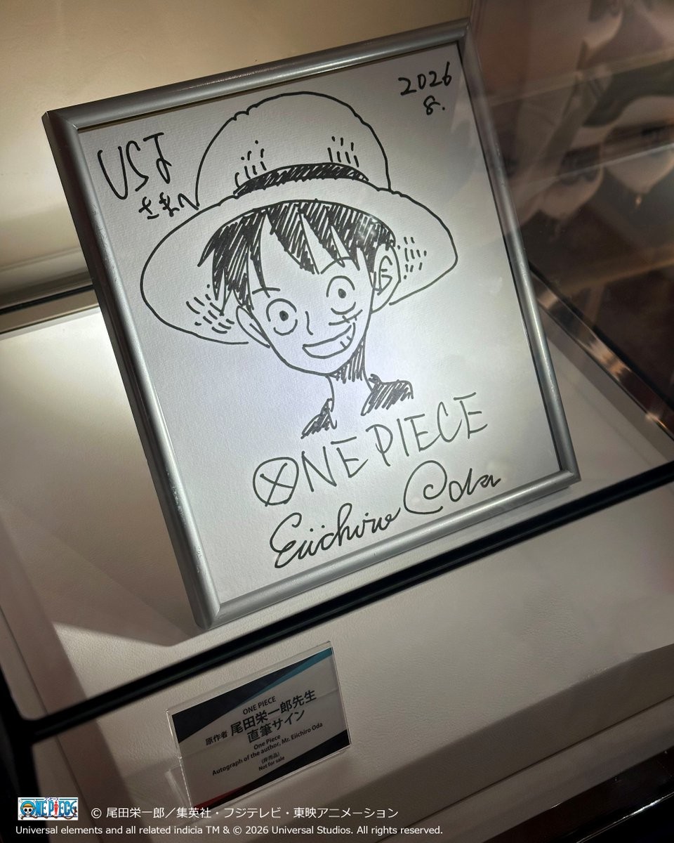 Eiichiro Oda’s framed Luffy illustration and autograph on display at Universal Studios Japan
