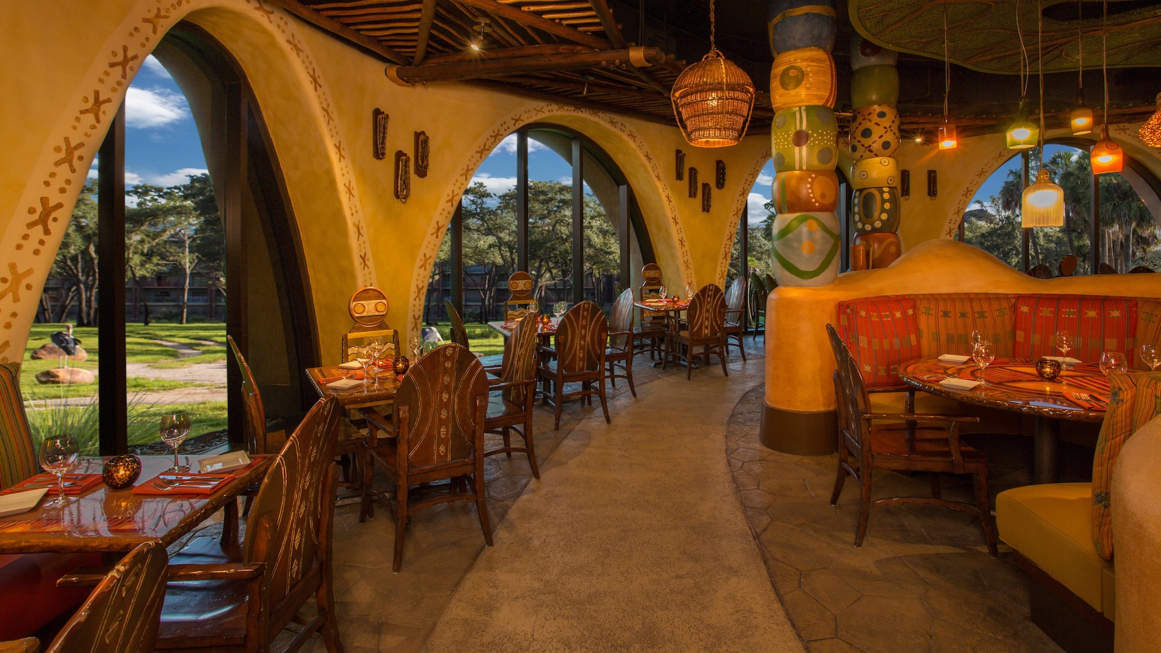 Dining room at Sanaa with windows looking toward the savanna at Disney's Animal Kingdom Lodge